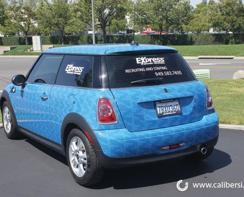 Vehicle wrapped in graphics