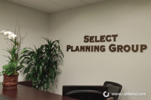 Select Planning Group Reception Desk Acrylic Painted Sign Lake Forest Orange County - Caliber Signs & Imaging in Irvine Call: 949-748-1070