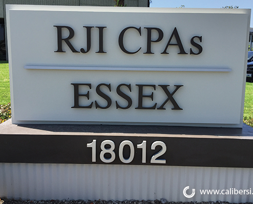 RJI and ESSEX monument sign - Orange County by Caliber Signs & Imaging in Irvine - 949-748-1070