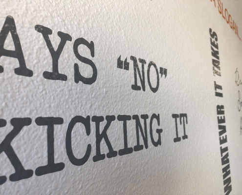 Cut Vinyl Lettering Applied on Low Painted VOC Walls