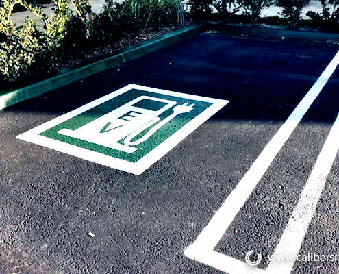 EV Parking Ground Signage EV painted Irvine CA Caliber Signs and Imaging